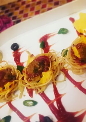 A picture of Spaghetti meat ball nest.