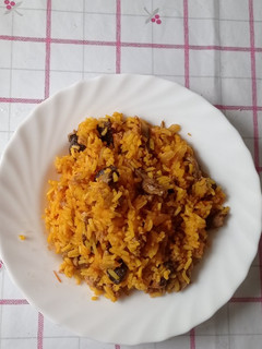 Una foto de Arroz con setas encebolladas