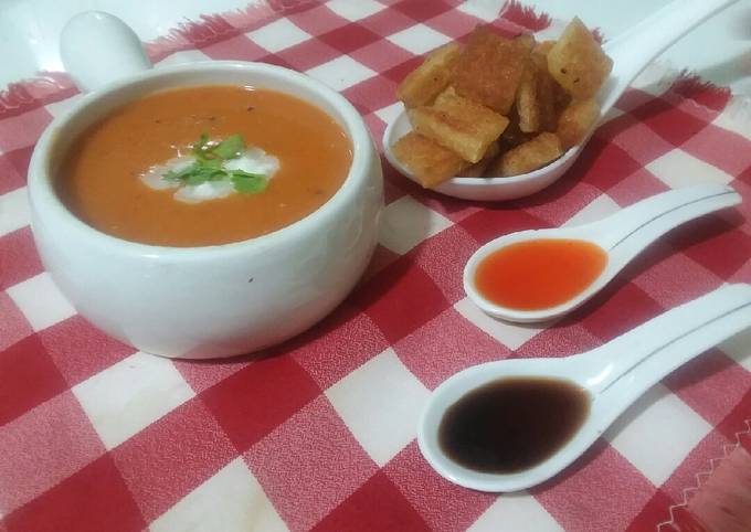 Tomato carrot soup with croutons