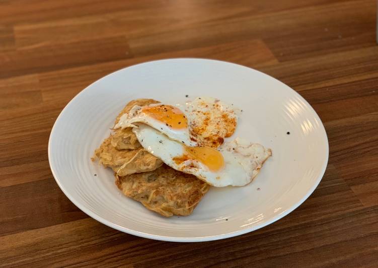 Potato hash browns with fried eggs