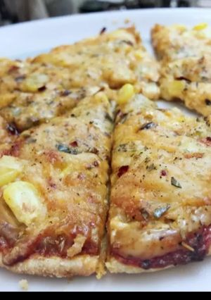 A picture of Homemade corn pizza.