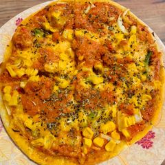 A picture of Thin-crust veggie pizza.