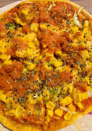 A picture of Thin-crust veggie pizza.