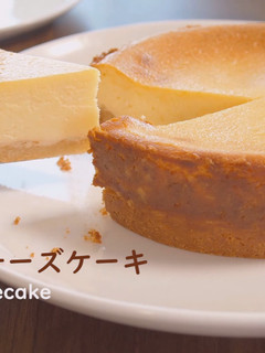 A picture of Cheesecake with Strawberry Sauce.