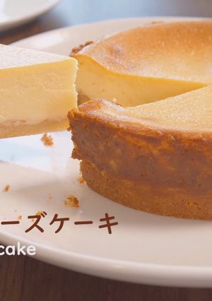 A picture of Cheesecake with Strawberry Sauce.