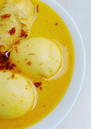 Foto resep Opor kuning Ayam Telur