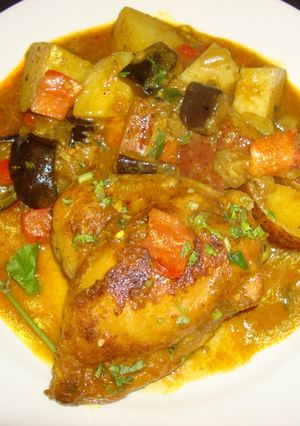 A picture of Chicken with Eggplant and Potatoes Curry.