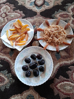 A picture of Suji Halwa with Finger Chips.