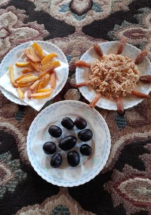 A picture of Suji Halwa with Finger Chips.