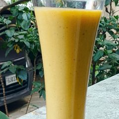 A picture of Creamy Mango Chicoo Twist Milkshake (Eid Special Refreshing Drink).