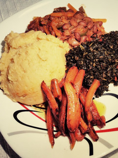A picture of Creamy garlic mashed potatoes with brown sugar baked Carrot's.