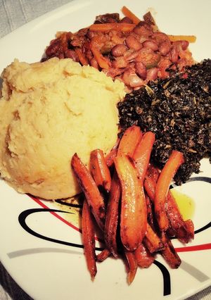 A picture of Creamy garlic mashed potatoes with brown sugar baked Carrot's.