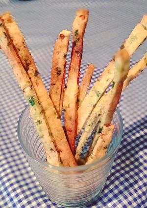 Una foto de Palitos de ajo, cebolla y perejil