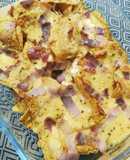 Nachos con panceta y salsa cheddar casera