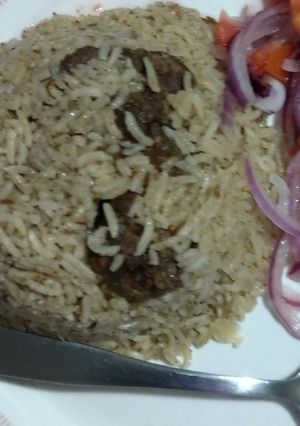 A picture of Beef pilau with tinge of coconut.