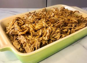 Una foto de Pulled pork a la cerveza (cerdo desmenuzado estilo gringo)
