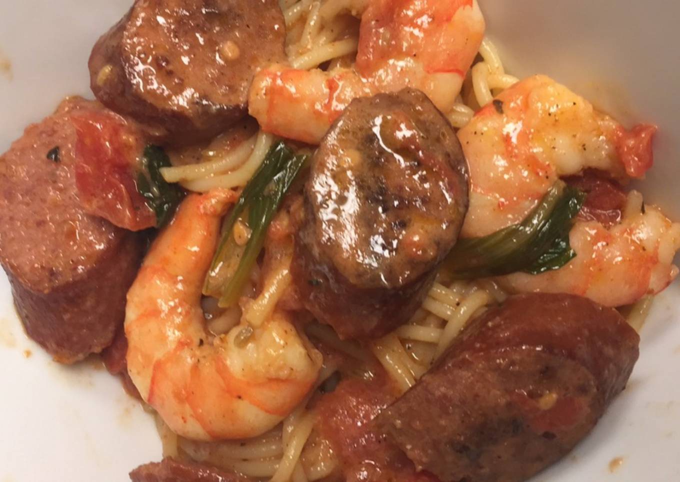 Pasta with Cajun prawns and smoked sausage