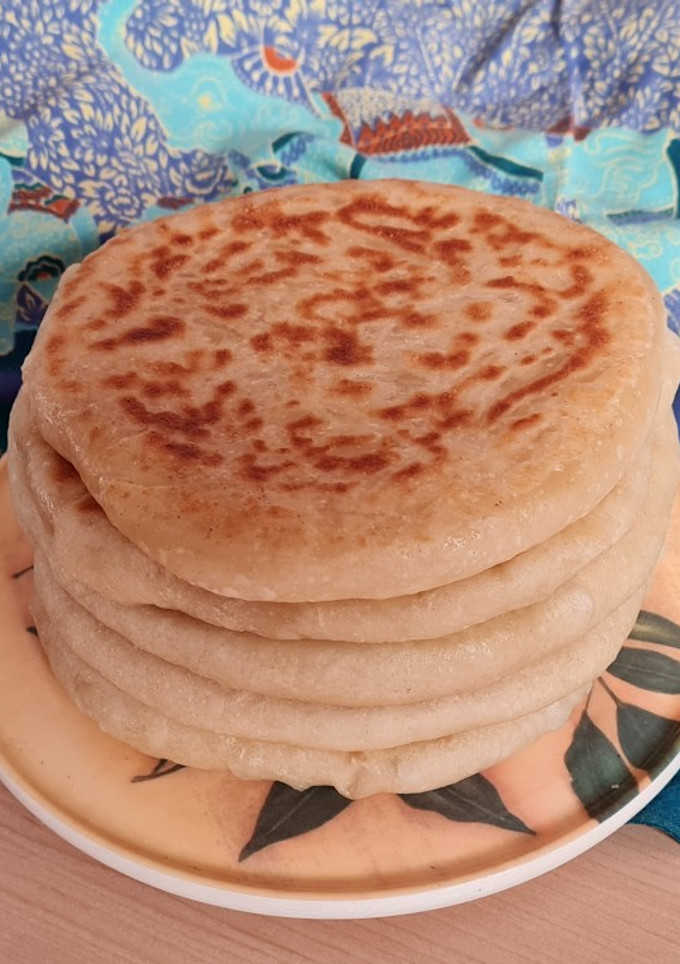 Una foto de Cheese Naan 🇮🇳 🧀 🫓 Pan indio Naan con queso
