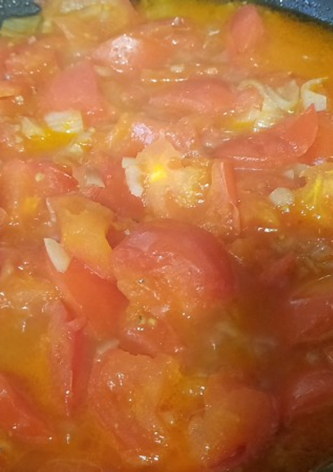 Una foto de Salsa de tomate pochado