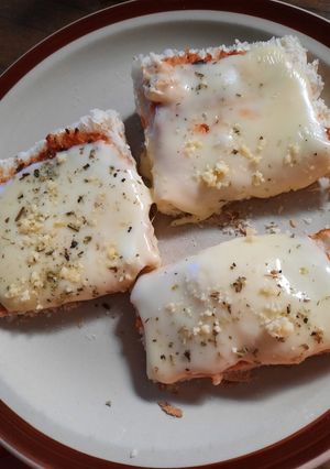 Una foto de Pizzetas económicas de pan cocidas a la plancha