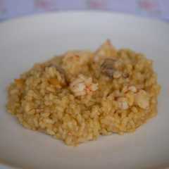 Una foto de Risotto de almejas y gambas