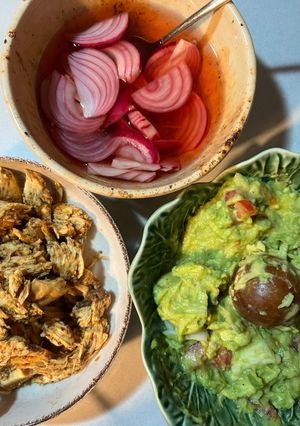 Una foto de Tacos de pollo desmechado