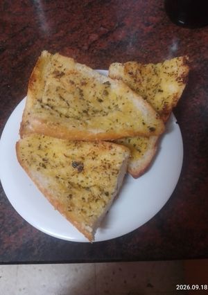 Una foto de Pan rustico al ajo a la plancha