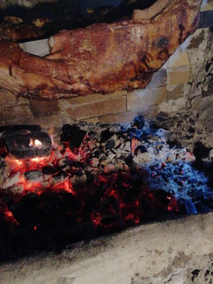 Una foto de Asado al palo