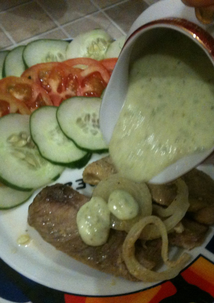 Una foto de Filetes de merluzas con salsa de queso crema y perejil