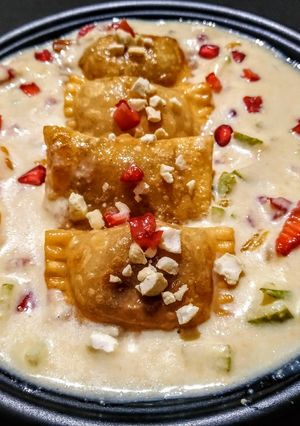 A picture of Fruity Gujiya in Rich Milk Sauce.