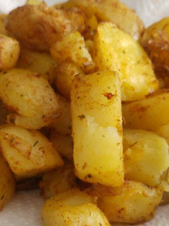 Una foto de Patatas al horno especiadas