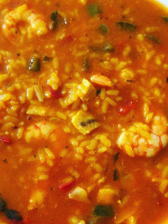 Una foto de Arroz caldoso con langostinos y pez espada