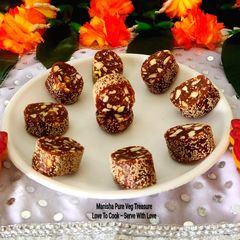 A picture of Nutty Dryfruits Dates Roll - Sugar-free - Khajur Roll Classic Mithai.