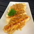 Salchichas de pollo caseras encebolladas