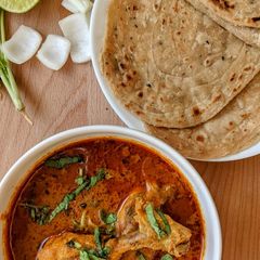 Chicken karahi & lachha paratha my style A picture of Chicken karahi & lachha paratha my style.