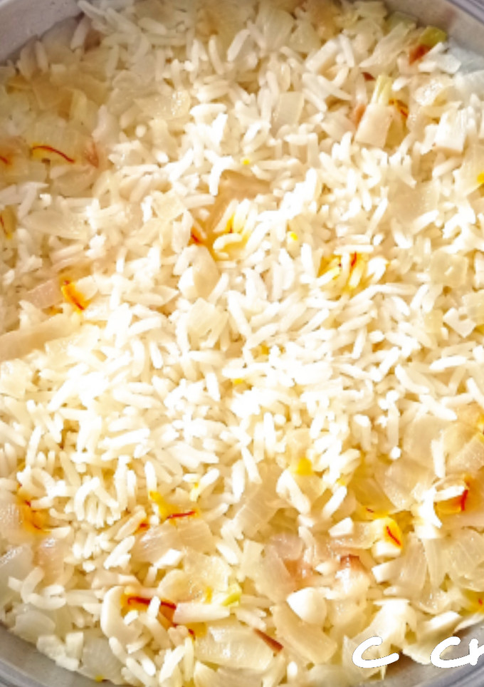 Una foto de Arroz blanco con cebolla