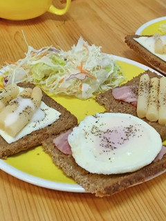 A picture of German-Style Open-Faced Sandwich with Dark Bread.