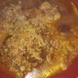 Guiso de arroz integral, osobuco y arvejas