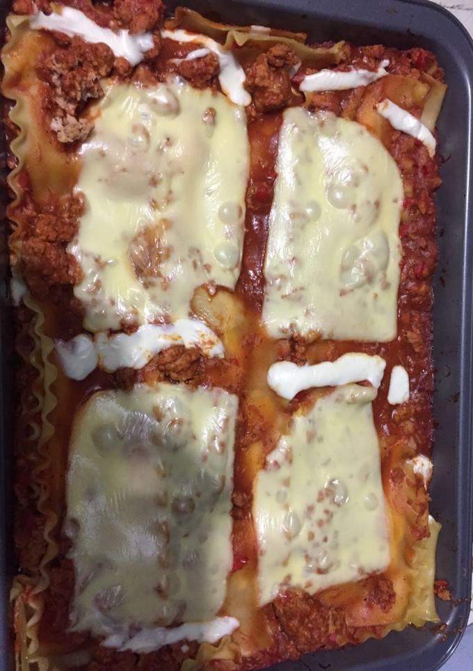 Una foto de Lasaña boloñesa