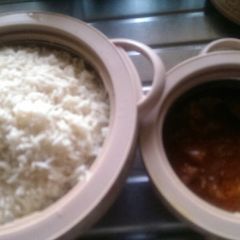 A picture of White rice and potato stew.