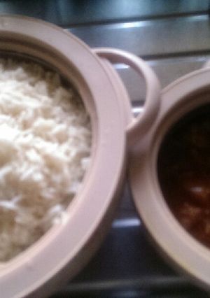 A picture of White rice and potato stew.