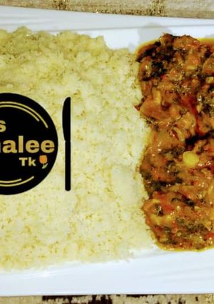 A picture of Cous cous da miyan alayyahu da yakuwa da gyada.