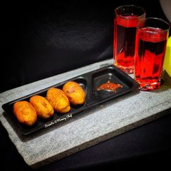 A picture of Bread dholaks (bread rolls).