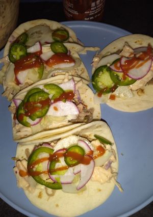 A picture of Spicy pork slaw taco.