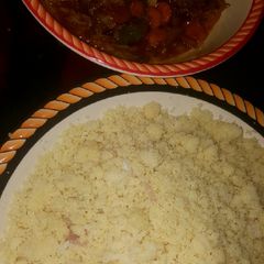 A picture of Cous_cous and vegetable source.