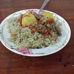 A picture of Rice masala with Potato & Beef stew.