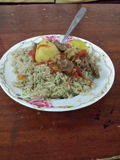 A picture of Rice masala with Potato & Beef stew.