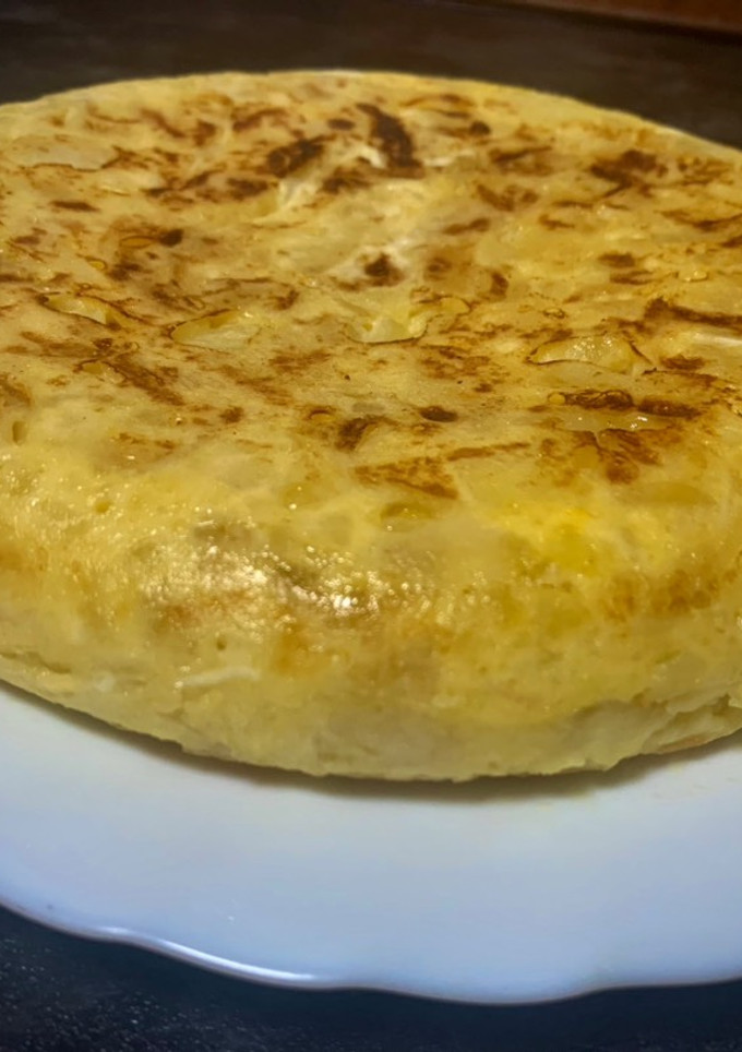 Una foto de Tortilla de patatas con cebolla