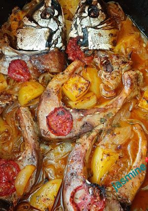 A picture of Fish (Baked Carp with Potatoes and Onions) 🧜♂️.