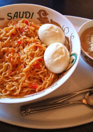 A picture of Indomie with boiled eggs.